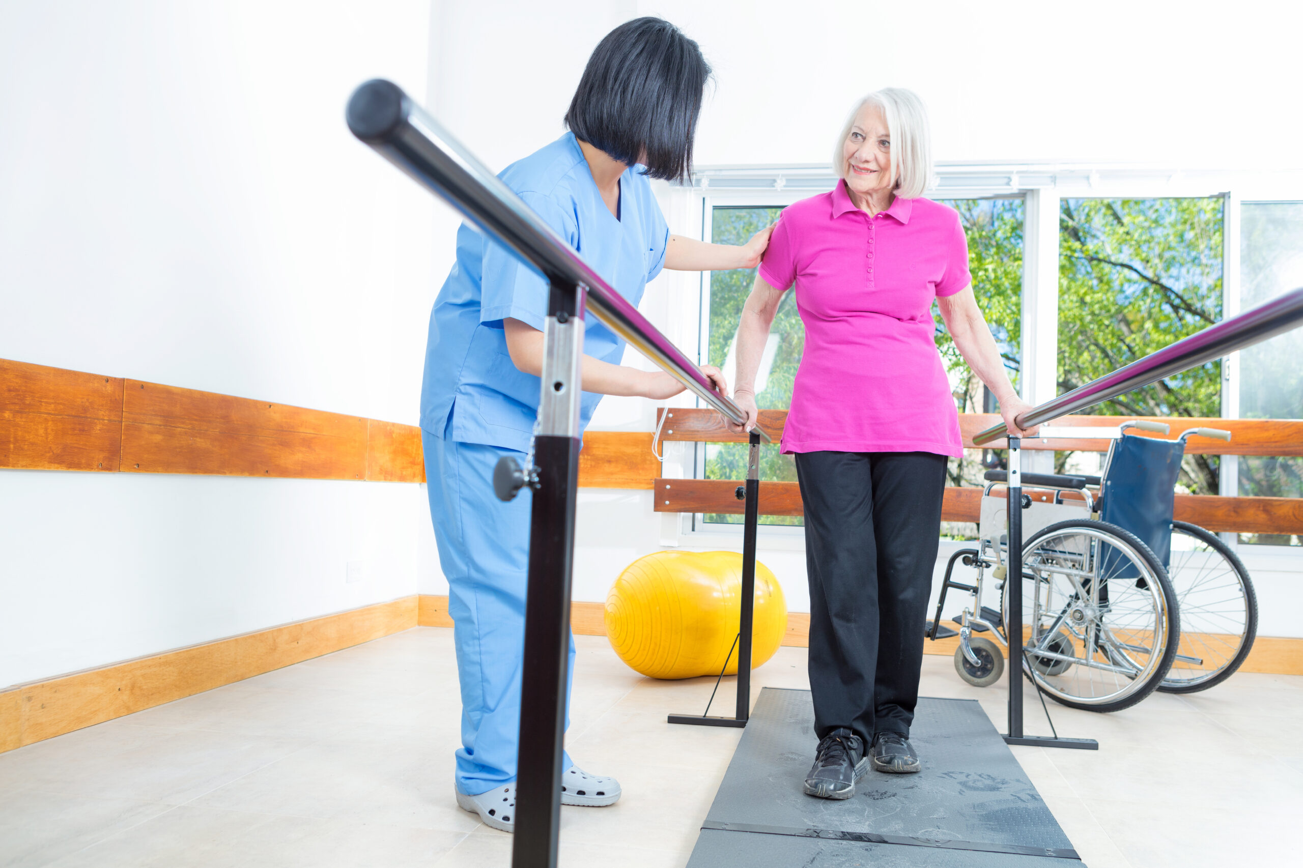 Rehabilitation clinic with elderly people and nurse